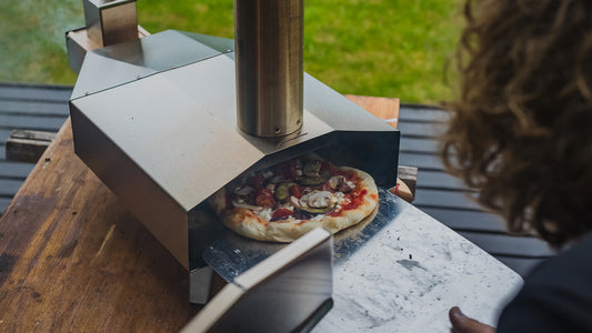 Mastering the Art of Outdoor Pizza Ovens: A Seasonal Guide to Perfect Pies